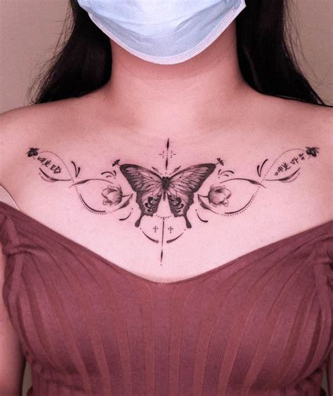 feminine chest tattoo